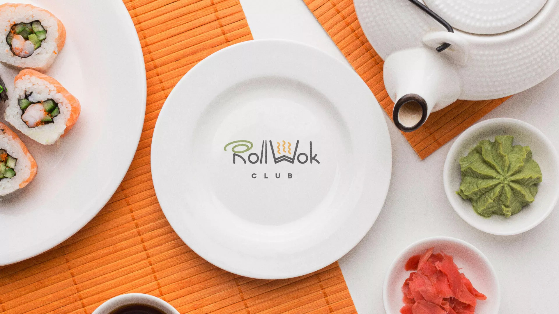 Разработка логотипа и фирменного стиля в Новодвинске для суши-бара «Roll Wok Club» Разработка логотипа и фирменного стиля в Новодвинске для суши-бара «Roll Wok Club»